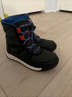 Sorel Black Kids Snow Boots with Blue Lining and Orange Tabs